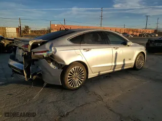 2017 Ford Fusion Energi Titanium with VIN 3FA6P0SUXHR379807, listed as a Copart auction lot 84885494 with 100,735 mi miles and Salvage Title. Bid and sale history available at carsss.com. Image 3.
