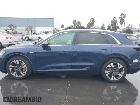 2022 Audi e-tron Premium Plus with VIN WA1LAAGE5NB022695, listed as a IAAI auction lot 41181338 with 14,711 mi miles and . Bid and sale history available at DreamBid. Image 15.
