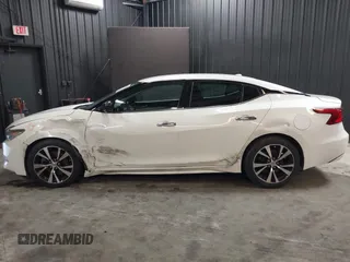 2018 Nissan Maxima SV with VIN 1N4AA6AP7JC406251, listed as a IAAI auction lot 41786523 with 117,403 mi miles and . Bid and sale history available at DreamBid. Image 6.