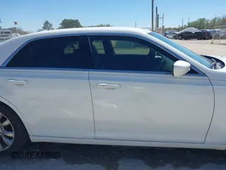 2016 Chrysler 300 Anniversary Edition with VIN 2C3CCAAG7GH313739, listed as a IAAI auction lot 41833824 with 285,806 mi miles and . Bid and sale history available at DreamBid. Image 14.