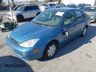 2000 Ford Focus LX with VIN 1FAFP33P8YW330922, listed as a IAAI auction lot 41643279 with 153,400 mi miles and . Bid and sale history available at carsss.com. Image 2.