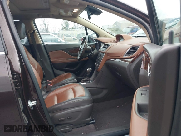 2013 Buick Encore Leather with VIN KL4CJCSB0DB144646, listed as a IAAI auction lot 41668384 with 122,082 mi miles and . Bid and sale history available at carsss.com. Image 5.