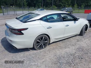 2023 Nissan Maxima SV with VIN 1N4AA6CVXPC512780, listed as a IAAI auction lot 42731800 with 49,972 mi miles and . Bid and sale history available at DreamBid. Image 4.