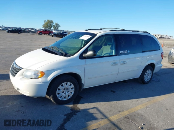 2005 Chrysler Town & Country LX z VIN 2C4GP44R65R509839, wystawiony jako IAAI lot #40433491 z przebiegiem 181 603 mil mil oraz . Historia ofert i sprzedaży dostępna na DreamBid. Obrazek 2.