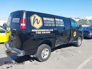 2016 Chevrolet Express Cargo Van with VIN 1GCWGAFF0G1154459, listed as a IAAI auction lot 41647930 with 100,142 mi miles. Bid and sale history available at carsss.com. Image 4.