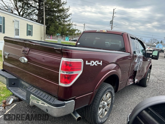 2009 Ford F-150 XL with VIN 1FTPX14V59FA13522, listed as a IAAI auction lot 41912606 with 157,185 mi miles. Bid and sale history available at carsss.com. Image 4.