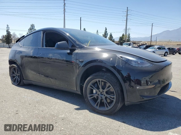 2024 Tesla Model Y Long Range with VIN 7SAYGDEE0RF123793, listed as a Copart auction lot 57177305 with 20,053 mi miles and Salvage title. Bid and sale history available at DreamBid. Image 4.