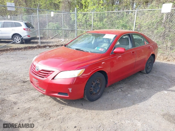 2009 Toyota Camry with VIN 4T1BE46K89U285834, listed as a IAAI auction lot 42062640 with 236,447 mi miles. Bid and sale history available at carsss.com. Image 2.