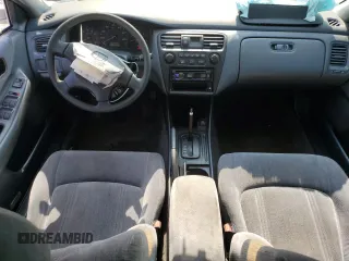1999 Honda Accord LX z VIN 1HGCG5647XA024074, wystawiony jako Copart lot #56057575 z przebiegiem Nie podano mil oraz Szkoda całkowita • Salvage title. Historia ofert i sprzedaży dostępna na DreamBid. Obrazek 8.