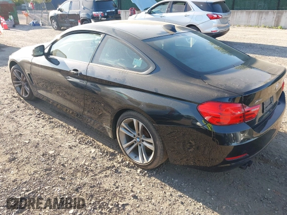2014 BMW 4 Series 428i xDrive with VIN WBA3N9C55EF721295, listed as a IAAI auction lot 42139256 with 85,472 mi miles and . Bid and sale history available at carsss.com. Image 3.