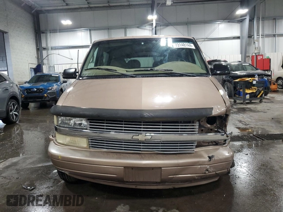 2002 Chevrolet Astro with VIN 1GNDM19XX2B149977, listed as a Copart auction lot 73148144 with 147,742 mi miles and Salvage Title. Bid and sale history available at carsss.com. Image 5.