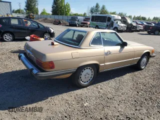 1987 Mercedes-Benz 560 SL z VIN WDBBA48D6HA060485, wystawiony jako Copart lot #57867585 z przebiegiem 120 808 mil mil oraz Tytuł czysty. Historia ofert i sprzedaży dostępna na DreamBid. Obrazek 3.