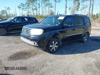2013 Honda Pilot Touring with VIN 5FNYF4H9XDB047796, listed as a IAAI auction lot 41591189 with 188,579 mi miles and . Bid and sale history available at carsss.com. Image 16.