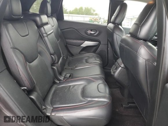 2017 Jeep Cherokee Trailhawk z VIN 1C4PJMBS0HW577055, wystawiony jako Copart lot #56428235 z przebiegiem 137 296 mil mil oraz Szkoda całkowita • Salvage title. Historia ofert i sprzedaży dostępna na DreamBid. Obrazek 11.