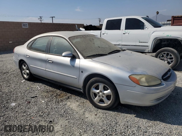 2002 Ford Taurus SE with VIN 1FAFP53272G198088, listed as a Copart auction lot 69810014 with 152,794 mi miles and Clean title. Bid and sale history available at DreamBid. Image 4.