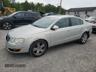 2009 Volkswagen Passat z VIN WVWJK93C49P054575, wystawiony jako Copart lot #57880855 z przebiegiem 148 327 mil mil oraz Szkody całkowita. Historia ofert i sprzedaży dostępna na DreamBid. Obrazek 1.