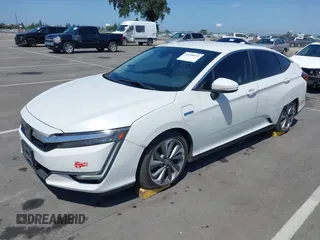 2018 Honda Clarity z VIN JHMZC5F10JC015706, wystawiony jako IAAI lot #42290573 z przebiegiem 158 987 mil mil oraz . Historia ofert i sprzedaży dostępna na DreamBid. Obrazek 2.