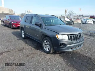 2013 Jeep Compass Latitude with VIN 1C4NJDEB7DD261645, listed as a IAAI auction lot 41948272 with 86,008 mi miles. Bid and sale history available at carsss.com. Image 1.
