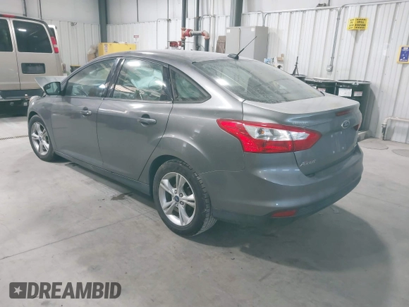 2014 Ford Focus SE with VIN 1FADP3F28EL285971, listed as a IAAI auction lot 41290979 with 149,900 mi miles. Bid and sale history available at carsss.com. Image 3.