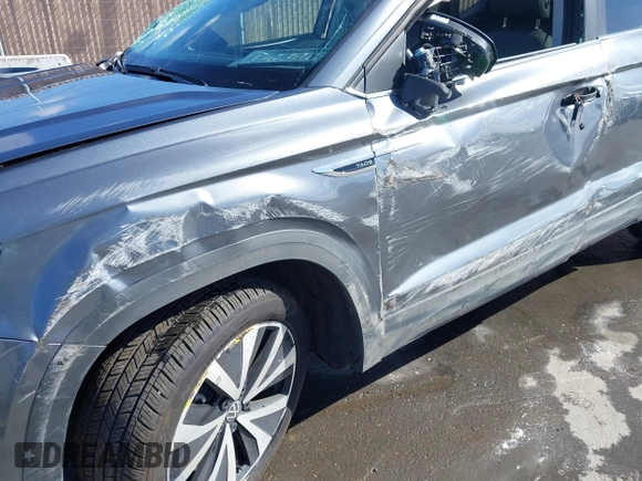 2024 Volkswagen Taos SE z VIN 3VVEX7B20RM075155, wystawiony jako IAAI lot #41709198 z przebiegiem 4 810 mil mil oraz . Historia ofert i sprzedaży dostępna na DreamBid. Obrazek 6.