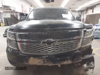 2015 Chevrolet Tahoe LT z VIN 1GNSCBKC1FR228488, wystawiony jako IAAI lot #41933869 z przebiegiem 164 523 mil mil oraz . Historia ofert i sprzedaży dostępna na DreamBid. Obrazek 13.