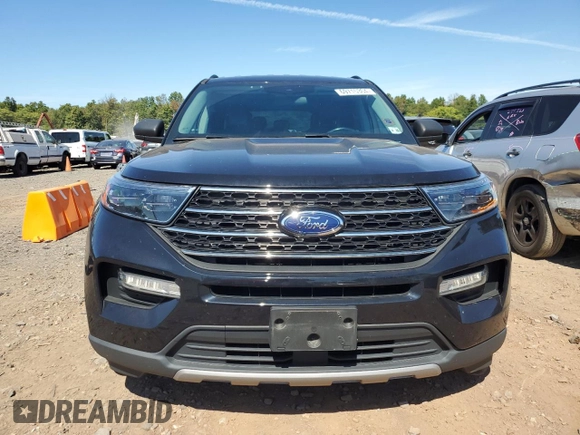 2021 Ford Explorer XLT z VIN 1FMSK8DH1MGB10047, wystawiony jako Copart lot #69715304 z przebiegiem 67 194 mil mil oraz Szkoda całkowita • Salvage title. Historia ofert i sprzedaży dostępna na DreamBid. Obrazek 5.