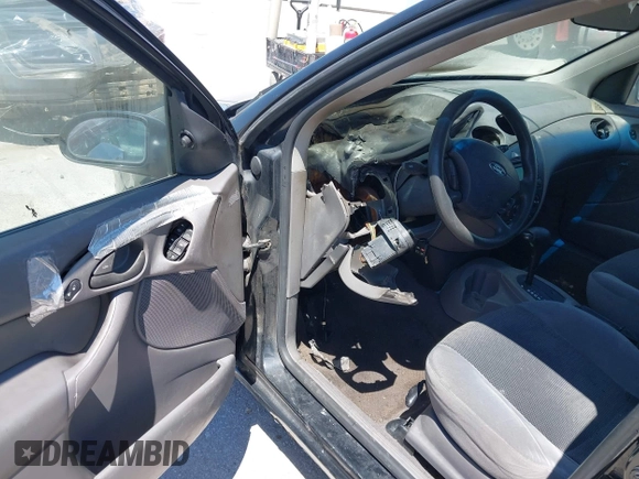 2003 Ford Focus SE with VIN 1FAFP34P83W150783, listed as a IAAI auction lot 42319653 with Not provided miles and . Bid and sale history available at DreamBid. Image 13.