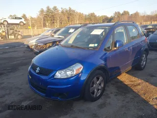 2012 Suzuki SX4 Crossover with VIN JS2YB5A34C6305897, listed as a IAAI auction lot 41176649 with 98,460 mi miles and . Bid and sale history available at DreamBid. Image 2.