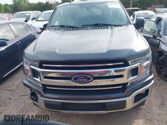 2020 Ford F-150 XL with VIN 1FTEX1CB7LFA04939, listed as a IAAI auction lot 42027862 with 56,383 mi miles and . Bid and sale history available at DreamBid. Image 12.