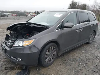 2015 Honda Odyssey Touring Elite with VIN 5FNRL5H92FB089627, listed as a IAAI auction lot 41115013 with Not Provided miles and . Bid and sale history available at DreamBid. Image 2.