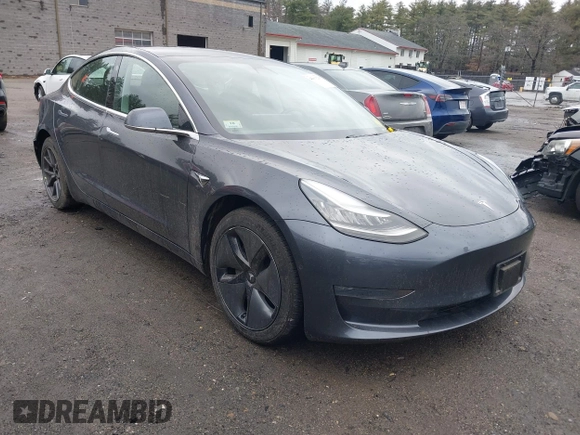 2019 Tesla Model 3 Mid Range with VIN 5YJ3E1EA3KF307415, listed as a IAAI auction lot 41673239 with 42,895 mi miles and . Bid and sale history available at DreamBid. Image 1.
