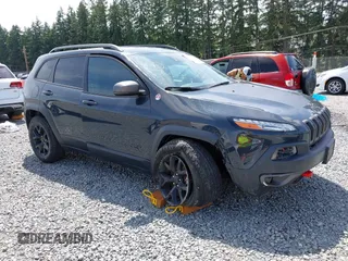 2017 Jeep Cherokee Trailhawk z VIN 1C4PJMBS0HW629008, wystawiony jako IAAI lot #42599022 z przebiegiem 40 774 mil mil oraz . Historia ofert i sprzedaży dostępna na DreamBid. Obrazek 1.