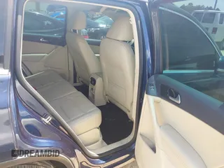 2012 Volkswagen Tiguan SE with VIN WVGAV7AX7CW534703, listed as a IAAI auction lot 42463358 with 119,699 mi miles and . Bid and sale history available at DreamBid. Image 8.