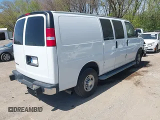 2020 Chevrolet Express Cargo Van with VIN 1GCWGAFG9L1213396, listed as a IAAI auction lot 42049377 with 122,571 mi miles. Bid and sale history available at carsss.com. Image 4.