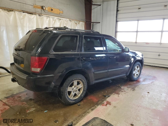 2007 Jeep Grand Cherokee Laredo with VIN 1J8GR48K07C643354, listed as a Copart auction lot 51635435 with 164,444 mi miles and Salvage Title. Bid and sale history available at carsss.com. Image 3.