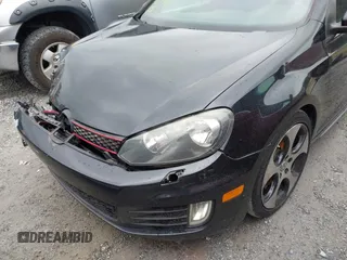 2012 Volkswagen GTI Autobahn z VIN WVWGV7AJ1CW157893, wystawiony jako IAAI lot #41623098 z przebiegiem 148 430 mil mil oraz . Historia ofert i sprzedaży dostępna na DreamBid. Obrazek 6.