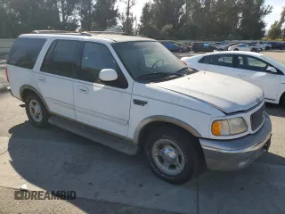 2001 Ford Expedition Eddie Bauer with VIN 1FMRU17L71LA40850, listed as a Copart auction lot 72085354 with 103,469 mi miles and Clean title. Bid and sale history available at DreamBid. Image 4.