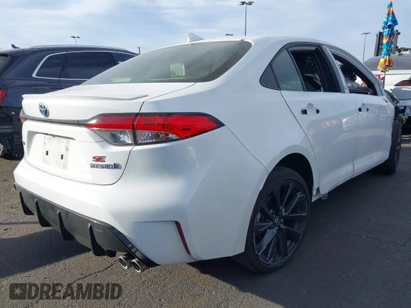 2023 Toyota Corolla Hybrid LE with VIN JTDBCMFE0P3018274, listed as a IAAI auction lot 41272268 with 24,880 mi miles. Bid and sale history available at carsss.com. Image 4.