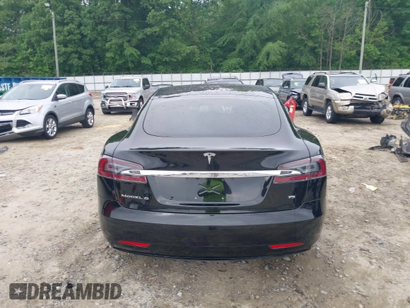 2017 Tesla Model S 60 with VIN 5YJSA1E1XHF232745, listed as a IAAI auction lot 41986834 with 89,581 mi miles and . Bid and sale history available at DreamBid. Image 16.