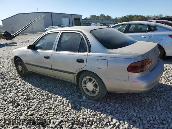2000 Chevrolet Prizm z VIN 1Y1SK5284YZ407566, wystawiony jako Copart lot #86148464 z przebiegiem 193 844 mil mil oraz Szkoda całkowita • Salvage title. Historia ofert i sprzedaży dostępna na DreamBid. Obrazek 2.