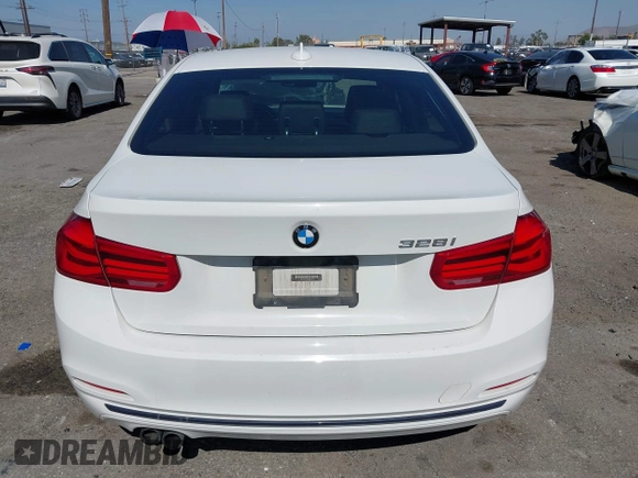 2016 BMW 3 Series 328i z VIN WBA8E9C56GK648695, wystawiony jako IAAI lot #42303074 z przebiegiem 106 192 mil mil oraz . Historia ofert i sprzedaży dostępna na DreamBid. Obrazek 16.
