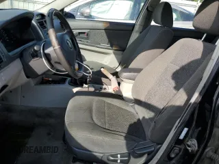 2005 Kia Spectra with VIN KNAFE161155153320, listed as a Copart auction lot 55231794 with 149,492 mi miles and Salvage Title. Bid and sale history available at carsss.com. Image 7.