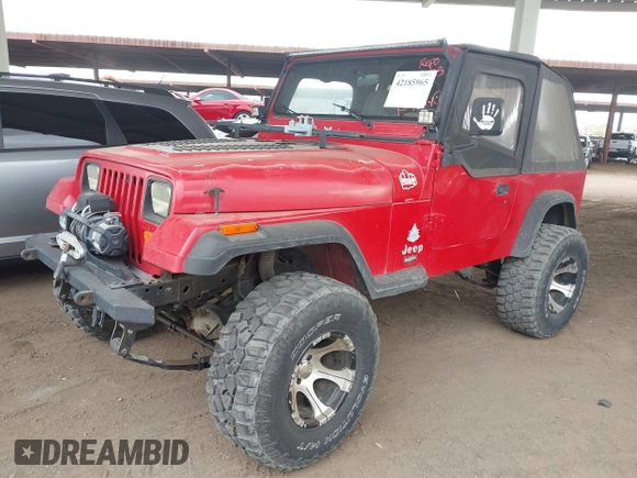 1994 Jeep Wrangler with VIN 1J4FY29S1RP437913, listed as a IAAI auction lot 42185965 with 245,618 mi miles and . Bid and sale history available at DreamBid. Image 2.