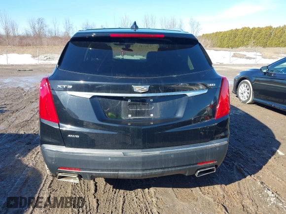 2019 Cadillac XT5 Premium Luxury AWD z VIN 1GYKNFRS1KZ250468, wystawiony jako IAAI lot #41764152 z przebiegiem 107 918 mil mil oraz . Historia ofert i sprzedaży dostępna na DreamBid. Obrazek 16.