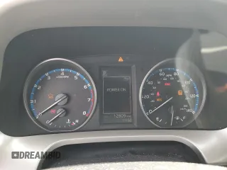 2018 Toyota RAV4 XLE with VIN 2T3RFREV1JW843426, listed as a Copart auction lot 52283125 with 12,809 mi miles and Salvage Title. Bid and sale history available at DreamBid. Image 9.
