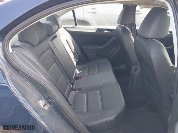 2014 Volkswagen Jetta Sedan SE with VIN 3VWD17AJ9EM303584, listed as a IAAI auction lot 41944386 with 130,921 mi miles. Bid and sale history available at carsss.com. Image 8.