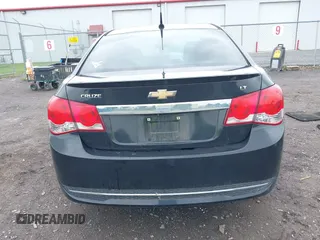 2014 Chevrolet Cruze 1LT z VIN 1G1PC5SB6E7138943, wystawiony jako IAAI lot #42368233 z przebiegiem 119 760 mil mil oraz . Historia ofert i sprzedaży dostępna na DreamBid. Obrazek 16.