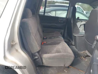 2002 Dodge Durango z VIN 1B4HR48N72F124778, wystawiony jako IAAI lot #41505251 z przebiegiem 264 232 mil mil oraz . Historia ofert i sprzedaży dostępna na DreamBid. Obrazek 8.