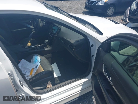 2016 Cadillac ATS-V z VIN 1G6AN5RY5G0151103, wystawiony jako IAAI lot #39630850 z przebiegiem 37 000 mil mil oraz . Historia ofert i sprzedaży dostępna na DreamBid. Obrazek 5.