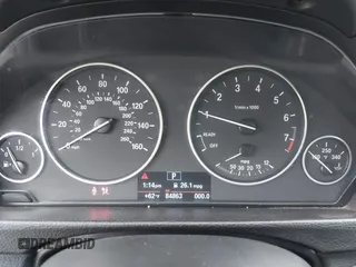 2015 BMW 3 Series 320i with VIN WBA3B1C5XFK140734, listed as a IAAI auction lot 42141319 with 84,863 mi miles and . Bid and sale history available at DreamBid. Image 7.